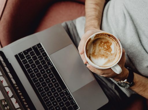 Coffee, cup, computer — Trusted HVAC Contractors Las Vegas Families Depend On Year-Round